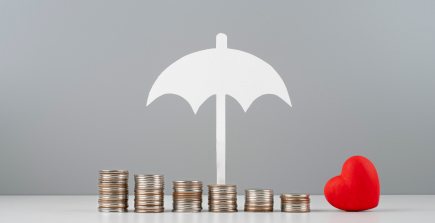 Family under an umbrella, symbolizing broad protection of personal umbrella insurance.